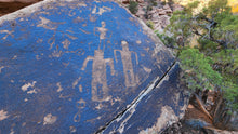 Load image into Gallery viewer, Carved into the desert varnish of a large boulder in Road Canyon, this rock art contains a mix of anthropomorphs and birds.
